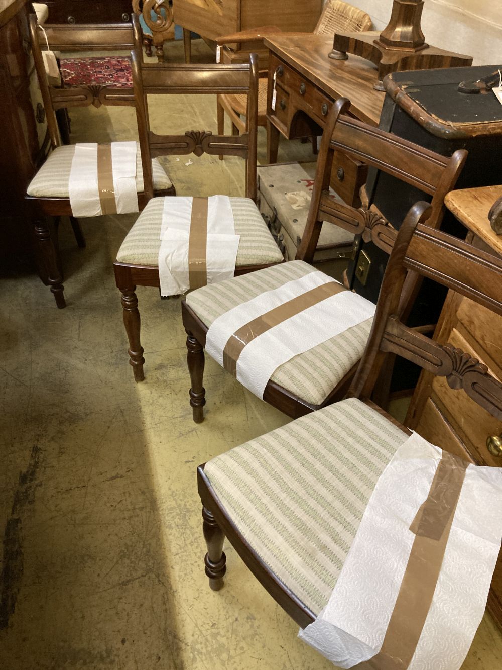 A set of eight Regency design mahogany dining chairs